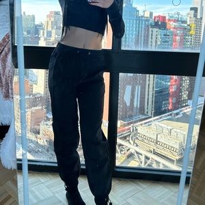 Black parachute pants.